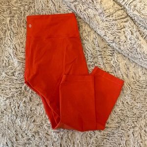 Lululemon leggings- red in color, size 4. Cropped below calf at 23” length.